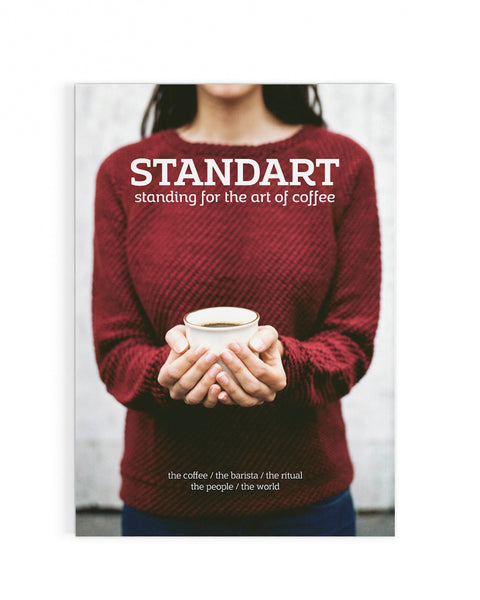 Woman holding coffee on the cover of Standart magazine, issue 1 